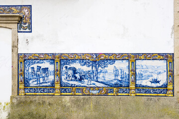 azulejos panels representing scenes from the countryside on the Leça do Balio train station near Porto, Portugal 