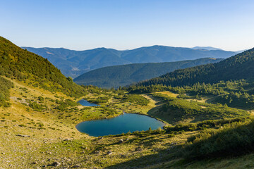 Lake Vorozheska a sunny day, Carpathians, Ukraine