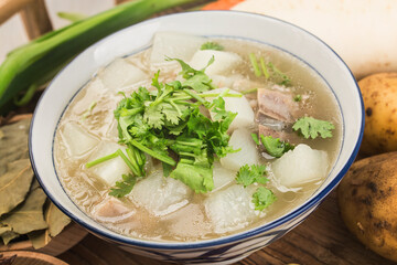 Chinese cuisine: radish and mutton soup stew