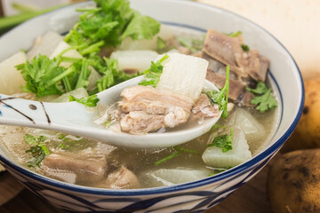 Chinese cuisine: radish and mutton soup stew