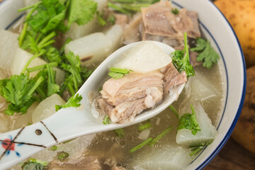 Chinese cuisine: radish and mutton soup stew