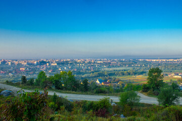 Fototapeta na wymiar view from the mountain to the city in the morning