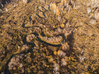 Aerial drone view of autumn landscape with river.