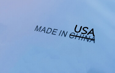 Fototapeta na wymiar Made in USA concept. A crossed word China and change to USA background