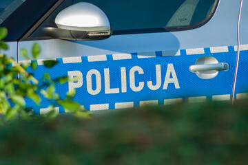 Crime, accident or strike concept. Polish police markings on the car. Police ( polish   "policja") © daily_creativity