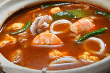 Tom yum or tom yam  is a type of hot and sour Thai soup, usually cooked with shrimp (prawn) Tom yum has its origin in Thailand. 