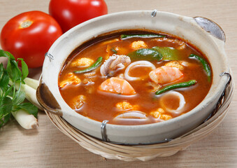 Tom yum or tom yam  is a type of hot and sour Thai soup, usually cooked with shrimp (prawn) Tom yum has its origin in Thailand. 