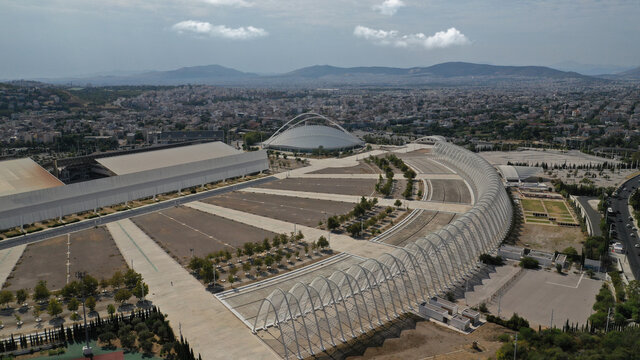 Aerial drone photo of iconic Olympic stadium and public facilities in Kalogreza called OAKA designed by Santiago Calatrava, Attica, Greece