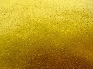 Golden concrete wall texture 