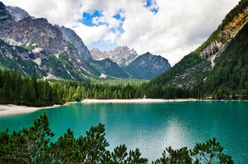 lake braies in the heart of val pusteria in trentino alto adige, a few kilometers from the border with austria