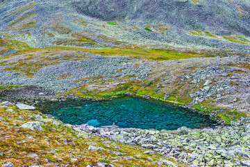 landscape mountain lake on cloudy summer day
