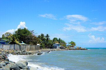 Small tropical town by the sea. Beautiful seascape.
