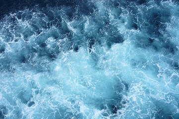 Foam on the surface of the seething sea. Abstraction. Background.