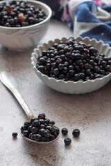 Fototapeta na wymiar Fresh picked blueberries on table, healthy seasonal raw fruits