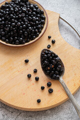 Fresh picked blueberries on table, healthy seasonal raw fruits