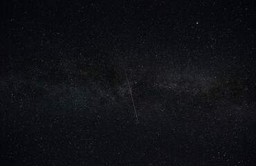 Starry sky at night and meteorite