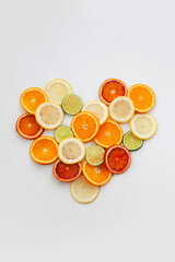 oranges and lemons slices in the shape of heart 