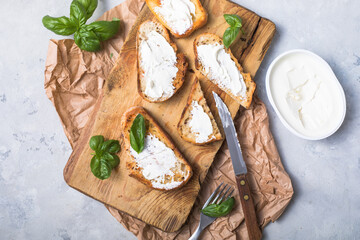 Tasty tapas, snack or crostini or Bruschetta with toasted baguette. Delicious breakfast, snack,...