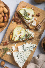 Pear, blue cheese, thyme sandwiches - delicious breakfast, snack, top view