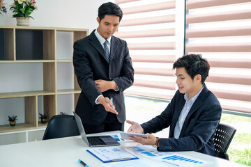 Young asian businessman working together in the office.