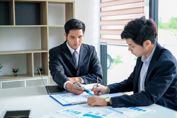 Young asian businessman working together in the office.