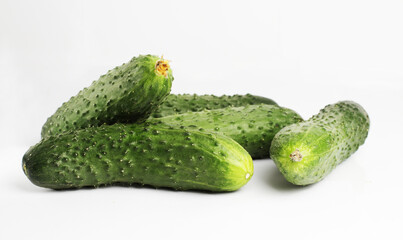  Fresh cucumbers. Isolated on a white background. Side view. group