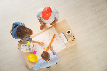 Team of young man and woman engineer and architects working, meeting, discussing, designing,...
