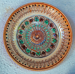 Fototapeta na wymiar Romanian traditional ceramic plate, Horezu, Romania