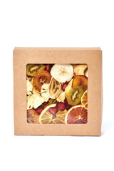 Dried fruits in craft paper box with transparent lid