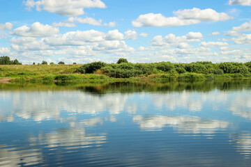 Beautiful Landscape with reflection on River Sky and Clouds.