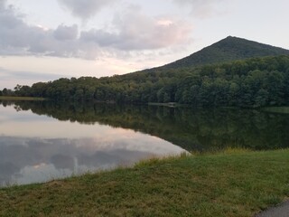 Fototapeta na wymiar View over a pond near the mountains