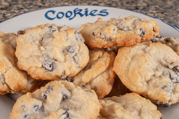 chocolatechip cookies on a plate that says cookies