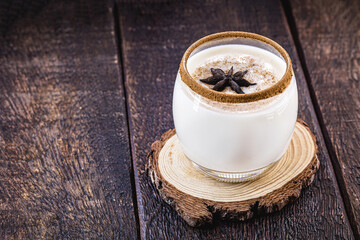 eggnog, typical winter drink, served hot. called eggnog, Auld Man milk, milk and pisco, momo cola, coquito or Crème de Vie or Eierlikör