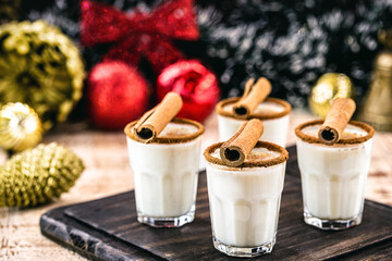 hot eggnog typical of Christmas, made at home all over the world, based on eggs and alcohol. called eggnog, Auld Man's milk, milk and pisco, momo cola, coquito or Crème de Vie or Eierlikör