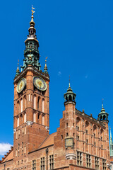 Gothic and Renaissance Old Town City Hall clock tower - Ratusz Glownego Miasta - at Long Market Dlugi Rynek in old town city center of Gdansk, Poland