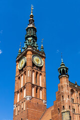 Fototapeta na wymiar Gothic and Renaissance Old Town City Hall clock tower - Ratusz Glownego Miasta - at Long Market Dlugi Rynek in old town city center of Gdansk, Poland