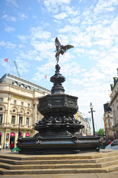 Memorial fountain with statue of Eros in Piccadilly Circus, London, England