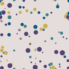 Abstract seamless pattern with colorful chaotic small circles. Infinity dotted messy geometric pattern. Random polka dot. Vector illustration.