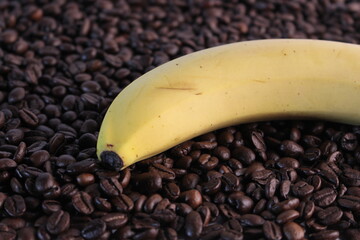 Delicious banana on coffee beans