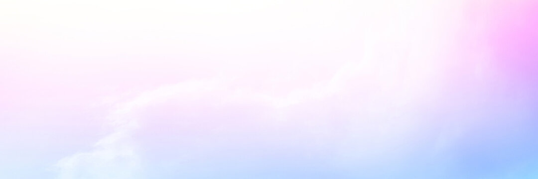 Colorful sky with Soft clouds. Fantasy magical sunny sky pastel background is fluffy white cloud. Freedom wallpaper concept. Sweet color dream.