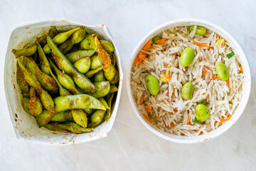 Take Away Boiled Steamed Basmati Rice with Edamame Beans and Vegetables in Plastic Box Package  Container.