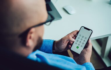 Anonymous man calling on smartphone