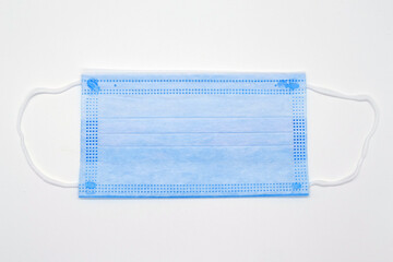 the back of a corona mask, isolated photo on white background, template for design and wallpaper, concept of pandemic, disease and science