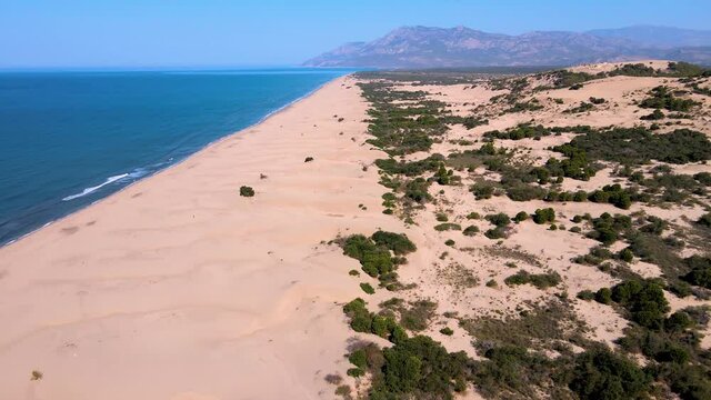 Aerial view of Patara Beach (camera tilt down) in Kaş/Antalya where Lycian civilization resided and currently popular for summer vacation