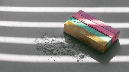 Light pattern on the composition of crayons.
Light and shadow, cubes of bright crayons.Chalk stick various colors close up.Kid stationary for art painting education. The composition of crayons.
