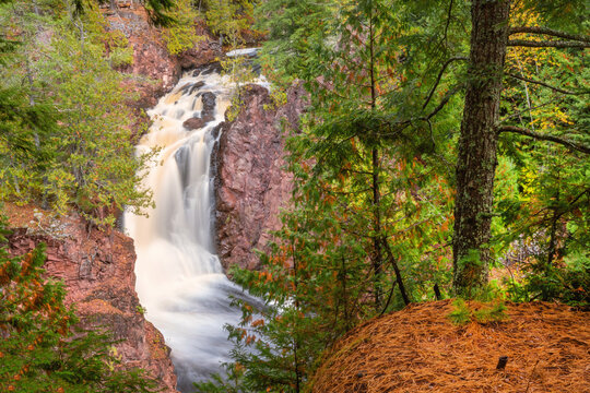 Water falls along Bad River at Copper Falls State Park during fall time	