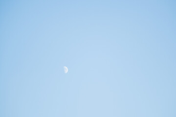 bright moon against blue sky
