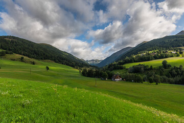 Fototapeta na wymiar green nature landscape with mountains and meadows