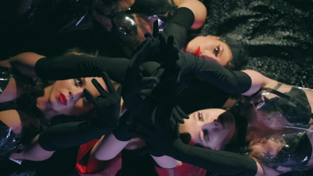 Fantastic video of sexy cyber raver girls filmed in fluorescent clothing under UV black light. Club party glamor style. Creative art