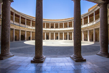 Fototapeta premium Round Patio and double colonnade of Charles V Palace, Granada, Andalusia, Spain